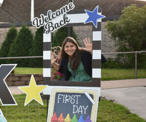 Catholic school principal in fun photo frame on first day of in-person school amid pandemic
